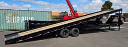 40' Hydraulic Tilt Deck Trailer Delco, With Removable Side Guides for Transporting Shipping Containers. Has Winch Mount on Front. 40' Hydraulic Tilt Deck Trailer Delco, With Removable Side Guides for Transporting Shipping Containers. Has Winch Mount on Front.