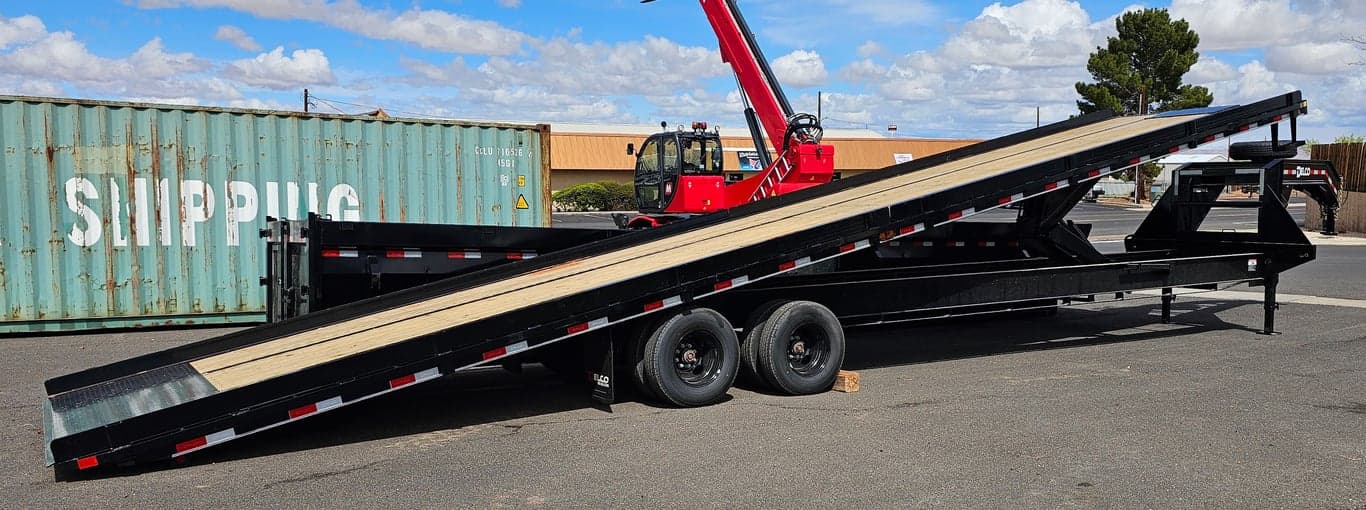 40' Hydraulic Tilt Deck Trailer Delco, With Removable Side Guides for Transporting Shipping Containers. Has Winch Mount on Front.  40' Hydraulic Tilt Deck Trailer Delco, With Removable Side Guides for Transporting Shipping Containers. Has Winch Mount on Front.